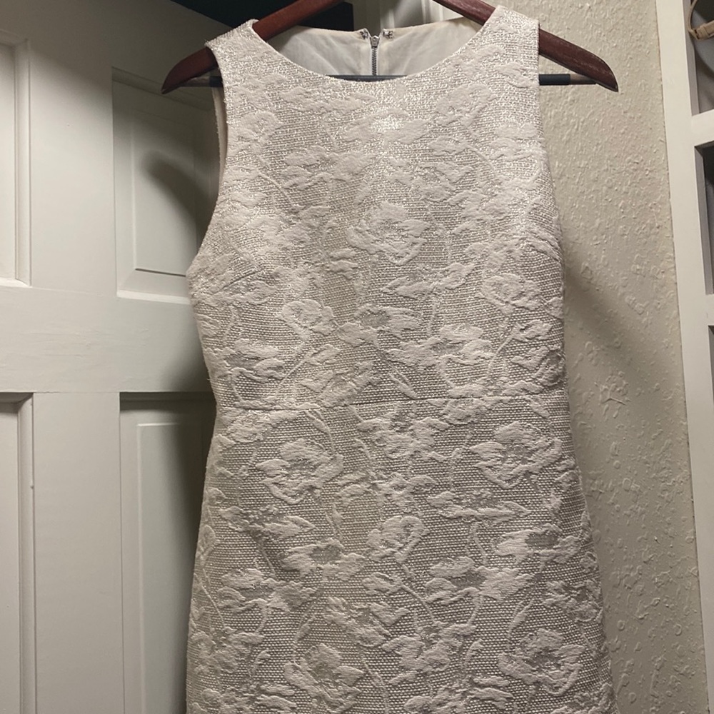 Beautiful Alice and Olivia dress in eggshell white with silver threaded accents
